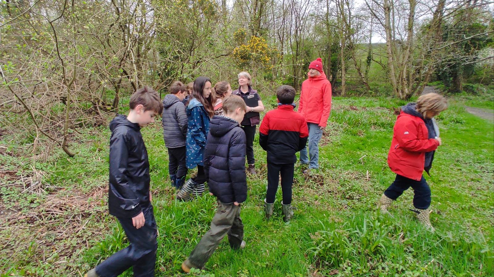 Students being shown riparian (riverside) habitat.