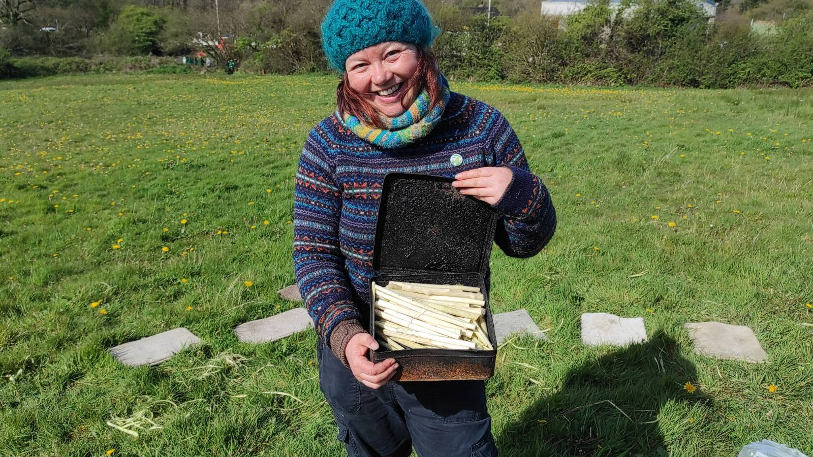 Jo ready to put the tin of willow sticks on the fire