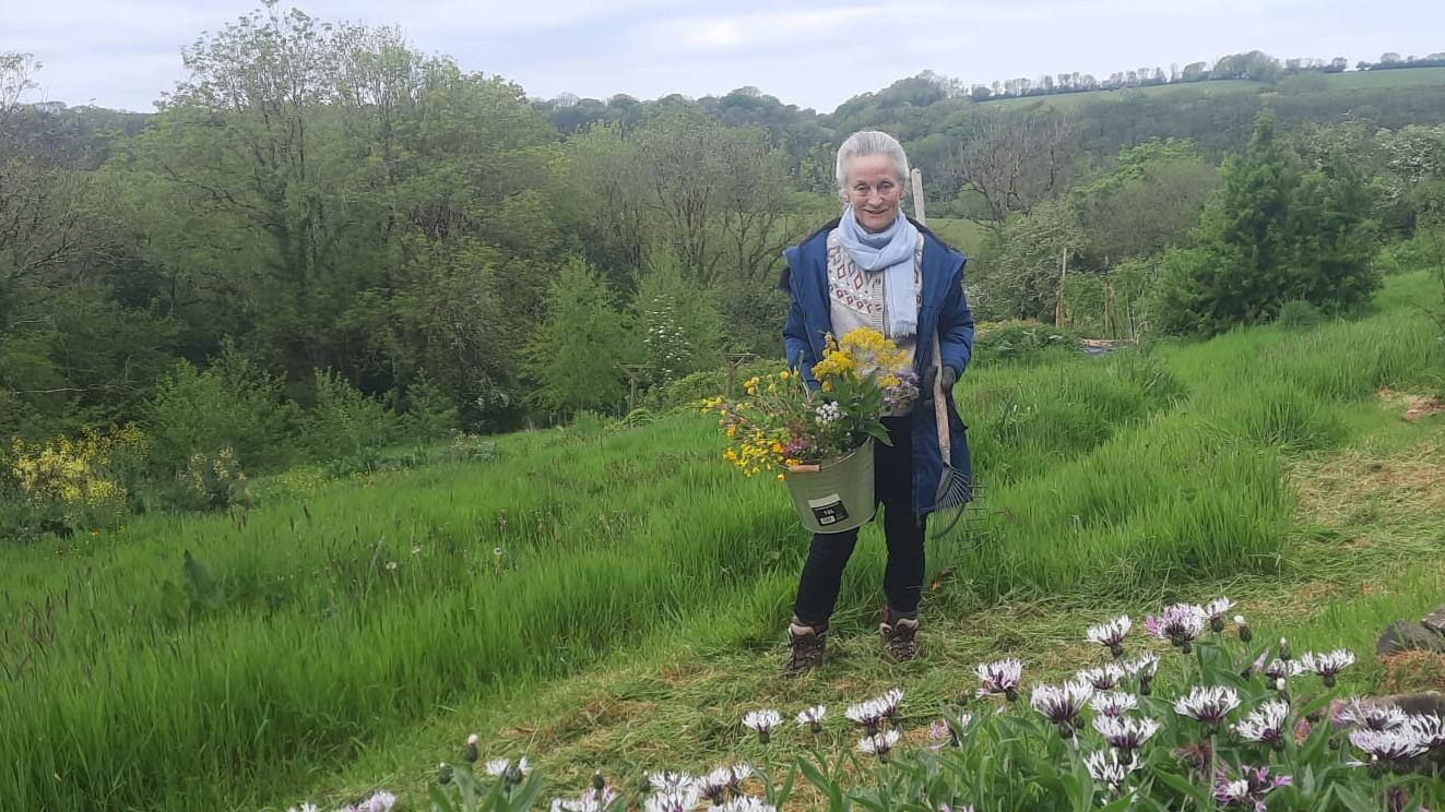 Molly's sister with a bucket of flowers!
