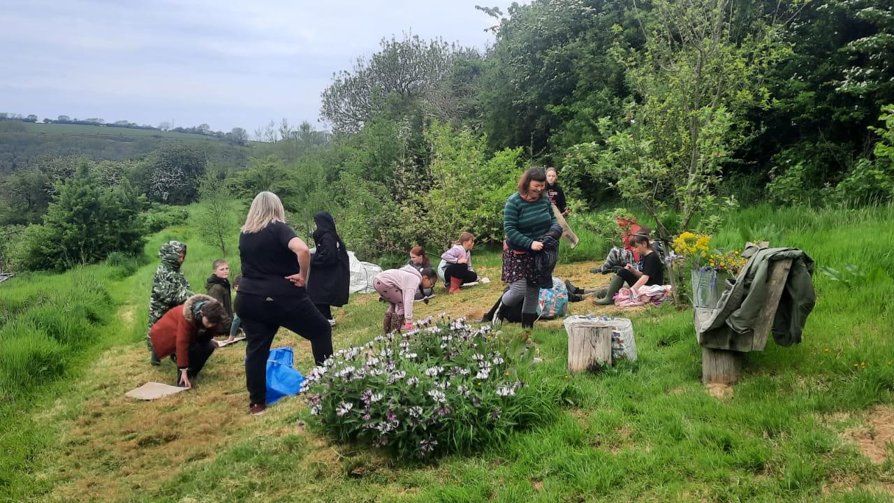 Cally, Jo and students setting up the circle with the seating pads