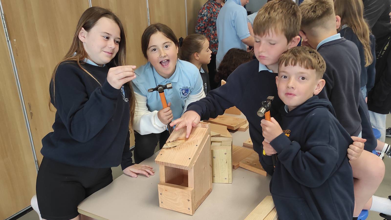 Students with finished Robin nest box