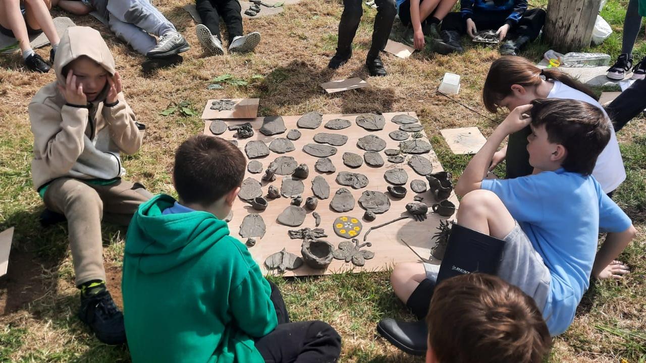 Students and the clay board