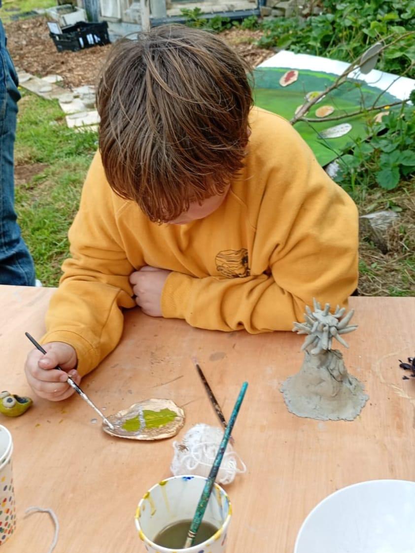 Student focussed on the painting