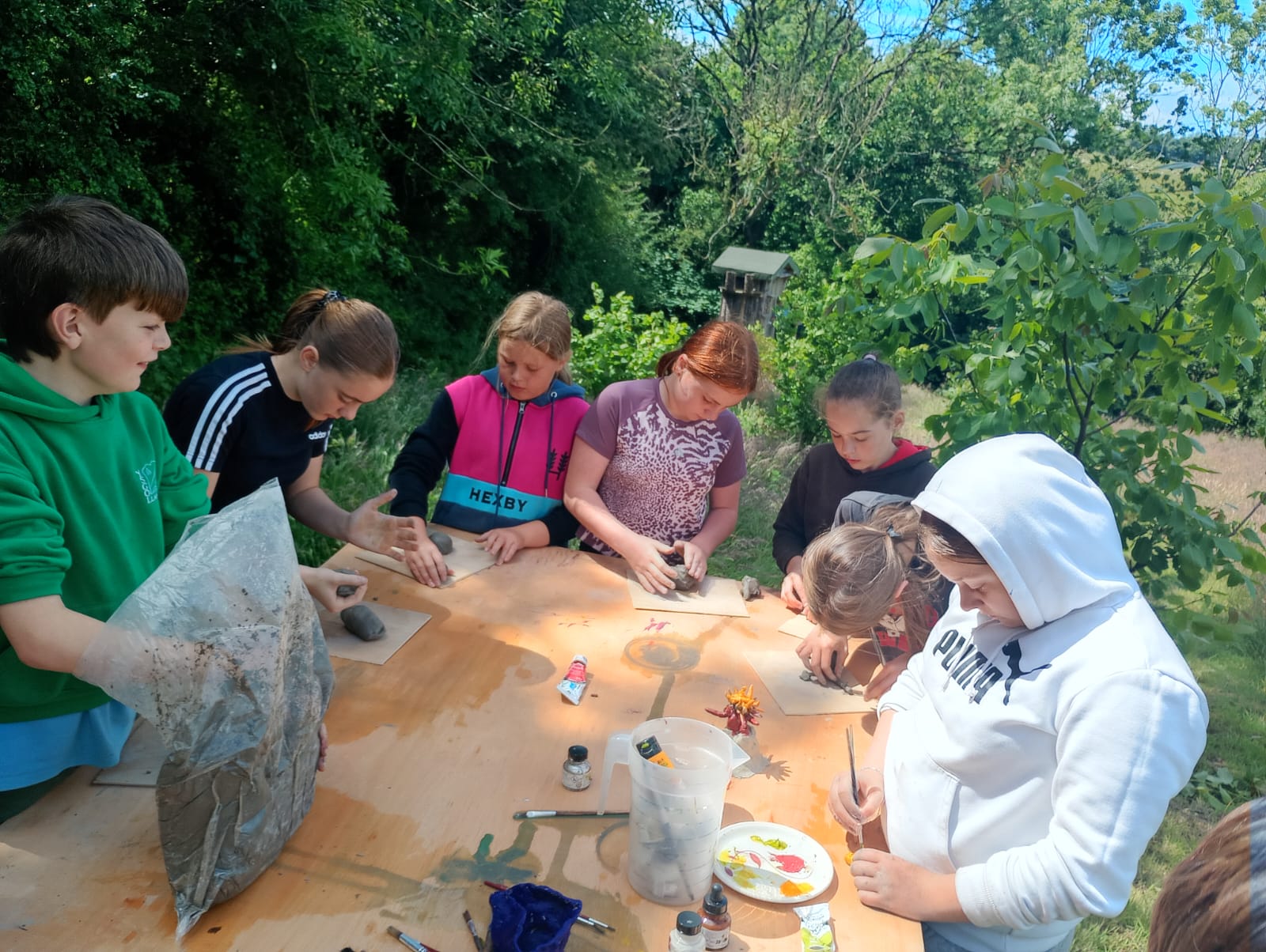 Making clay moidels at the art table