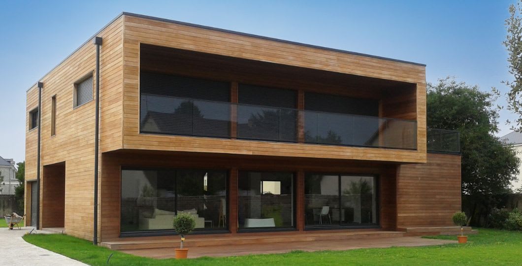 Maison avec un bardage bois traditionnel