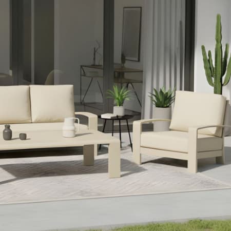 Fauteuil bas de jardin aluminium - Cordouan  image en situation du fauteuil cr&egrave;me