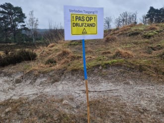 Waarschuwingsbord op de Brunssummerheide