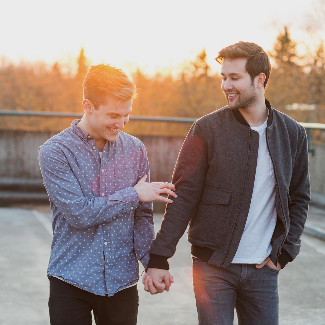 a couple walking at sunset