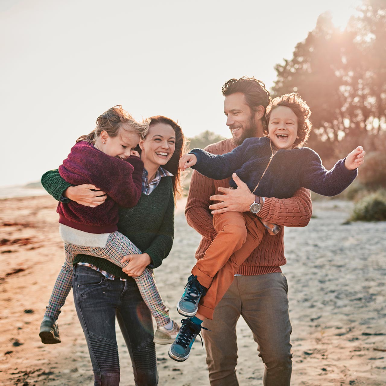 a young family at the beach