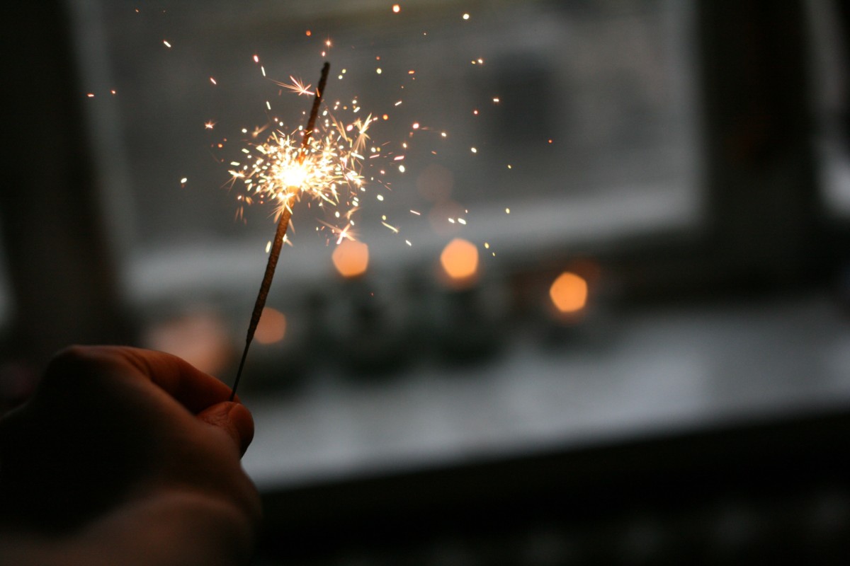 person holding a sparkler