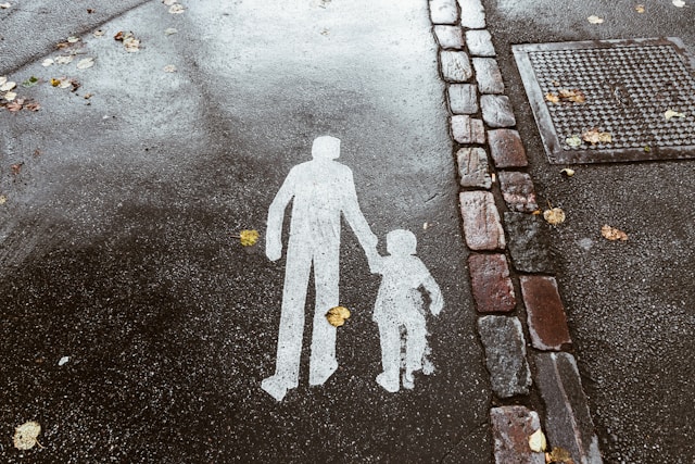 Sidewalk markings on a rainy day