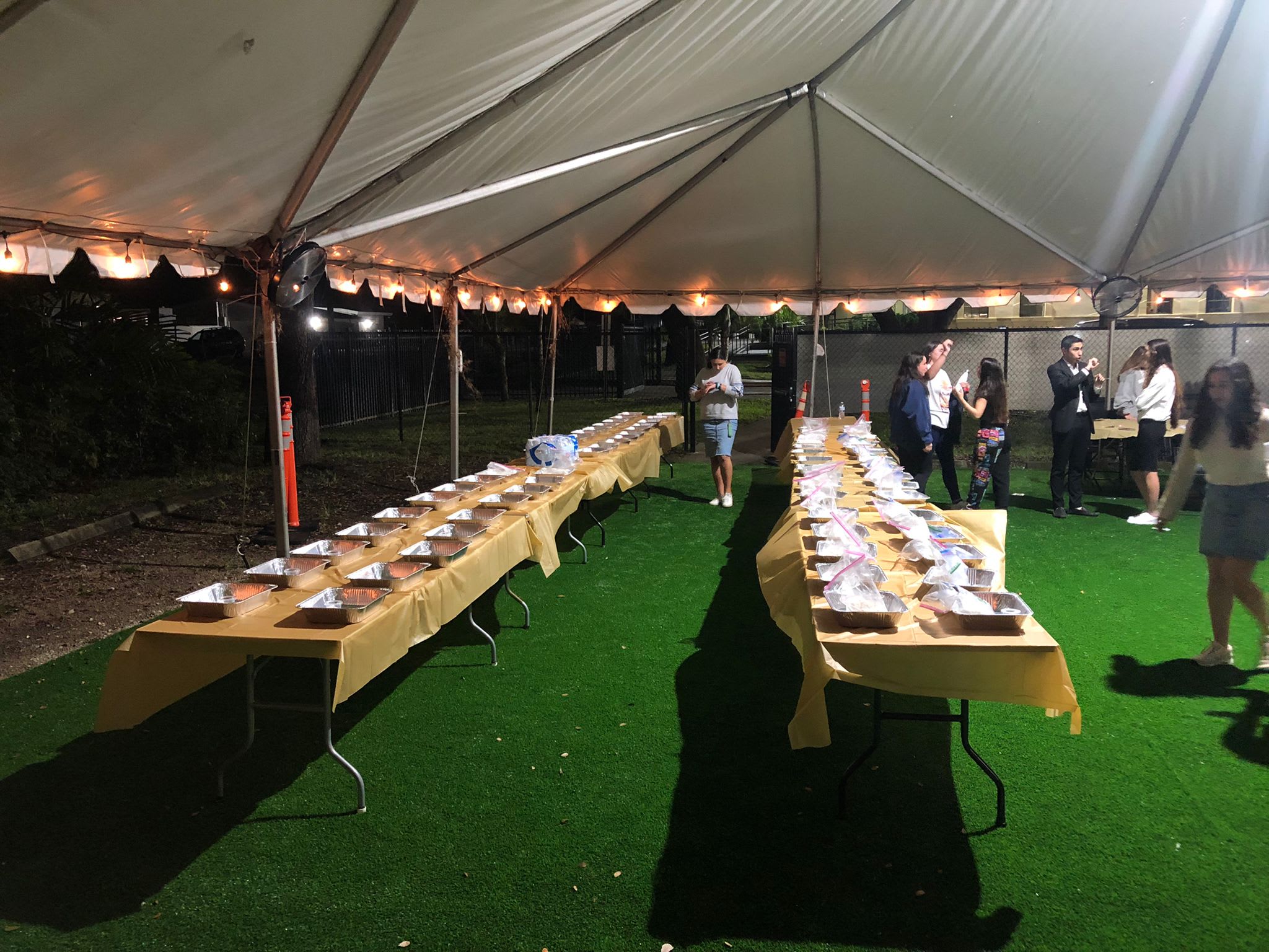 Setting up for the Shevet Glaubach Fellow challah bake in Hollywood