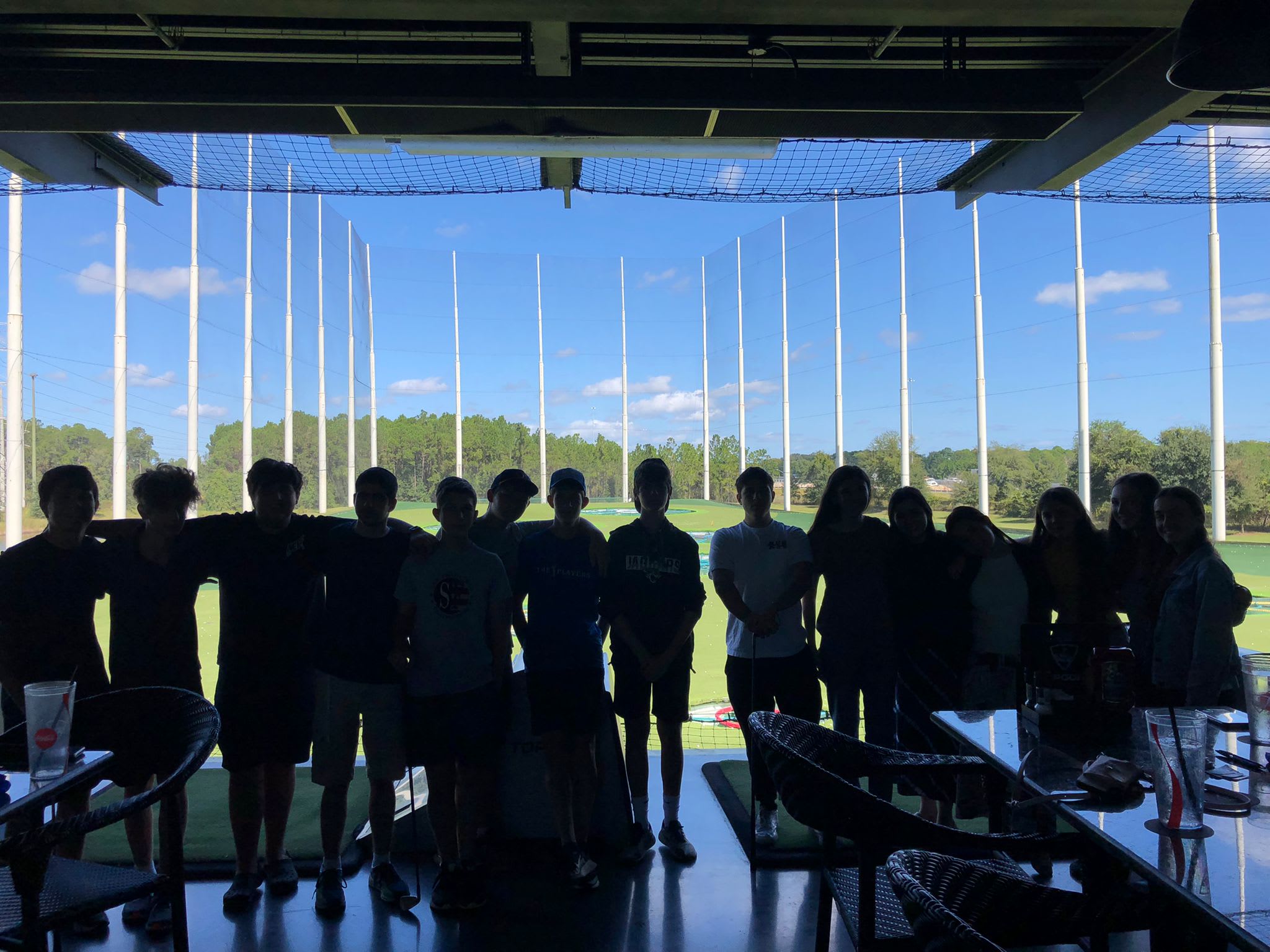 Jacksonville teens and fellows at Topgolf