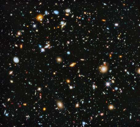 9. How old is the universe in years?