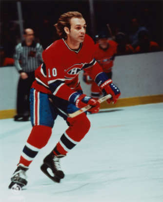 22. Only 3 players have won both the Conn Smythe and Hart Memorial Trophy in the same year. They are Wayne Gretzky, Bobby Orr, and which other hockey great?