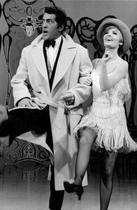 34. Which 60s variety-comedy series includes the theme song "Everybody Loves Somebody"?