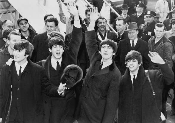 8. Which black-and-white 1960s comedy follows the Beatles in a fake documentary style?