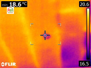 Thermal imaging survey of a wall-to-floor junction showing a perimeter heat-loss path — East London