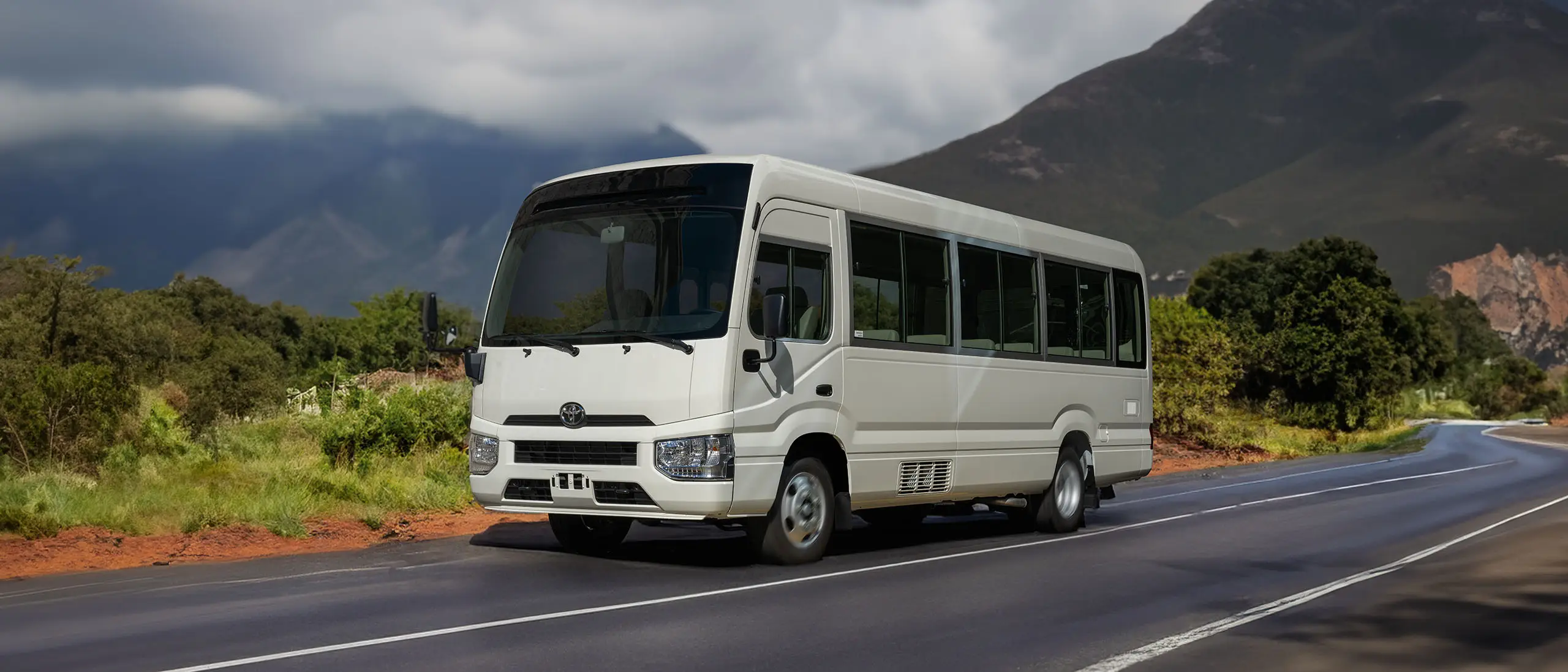Toyota Coaster or similar 3