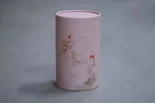 Lyserød urne med fugl