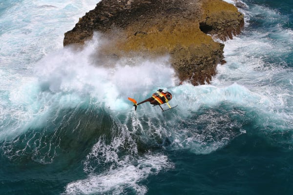 never-better-paradise-helicopter-oahu-magnum-over-crashing-waves