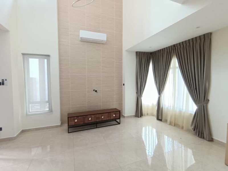 sheer white roller blind raised at the top of a narrow side window, daylight glowing through