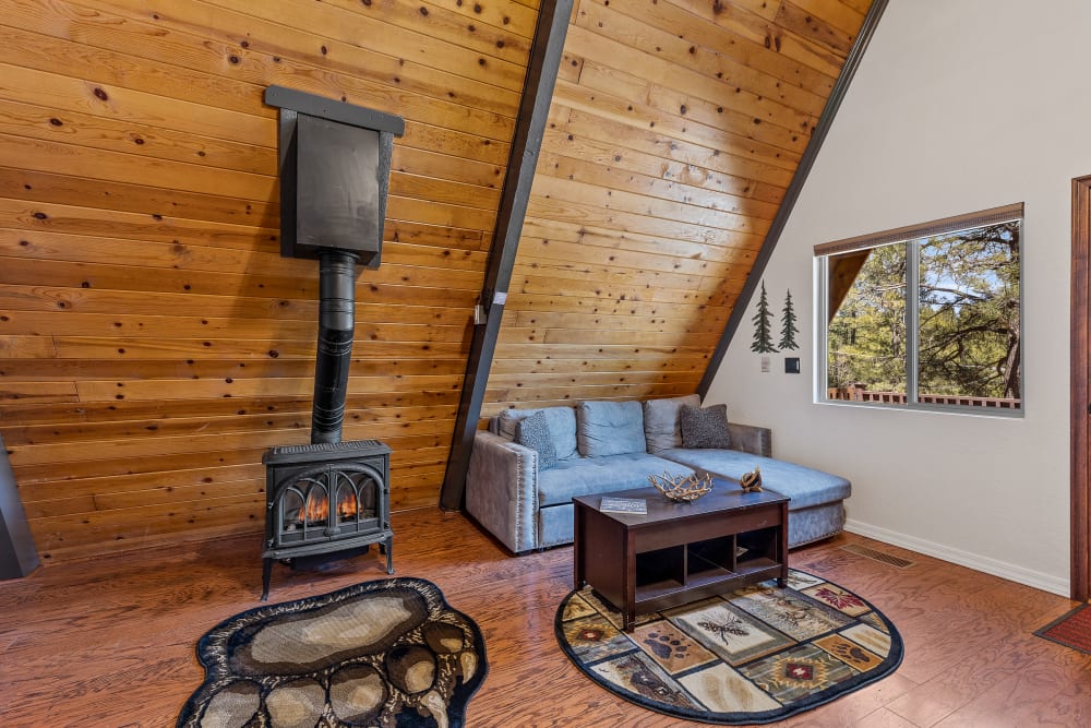 Large common room area- great place to start the day with that first morning cup, over looking the gorgeous pines right outside ! 