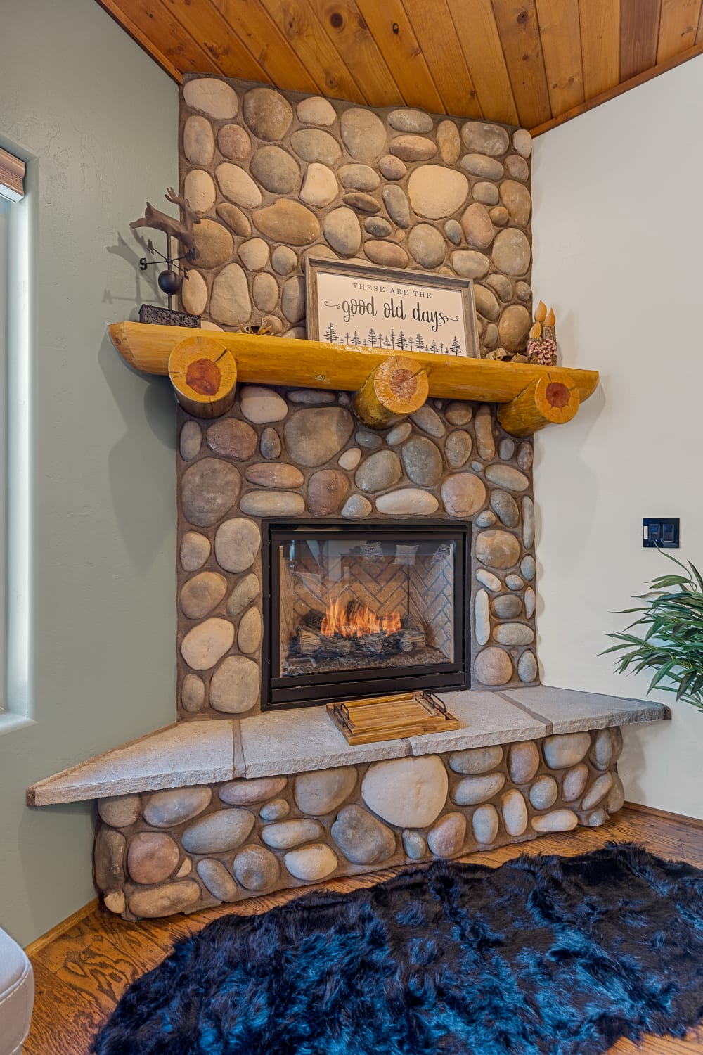 Large real river rock custom fireplace to enjoy in those cool Flagstaff evenings!