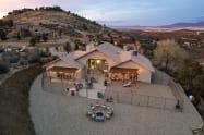 Fully fenced backyard, open firepit, gorgeous views, outdoor seating for large families, friends getaways, corporate retreats, etc. 