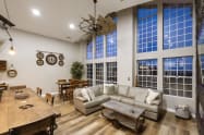 The centrally located great room is the perfect gather place for large families, corporate retreats, family and friends get togethers. Seating for everyone with room to roam.