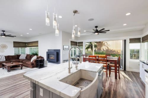 Imagine cooking in this fully remodeled Gourmet Chef's Delight Kitchen. Triple stack professional grade Thermador ovens, 6 burner stove, pot filler, and large island with extra large industrial style Farmhouse sink.  Perfect for the family cook, and entertaining!