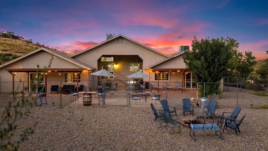 Spacious cafe style outdoor seating for your large group.  Complimented with a firepit area to finish your night