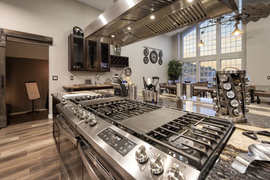 Just imaging cooking gourmet meals on 8 burners, 2 griddles, 2 ovens, 60” gas stove with view of Prescott Valley, & Stone Ridge Golf Course from 17’ floor to ceiling windows with an 86” Smart TV & linear fireplace. Private Chef referrals available!