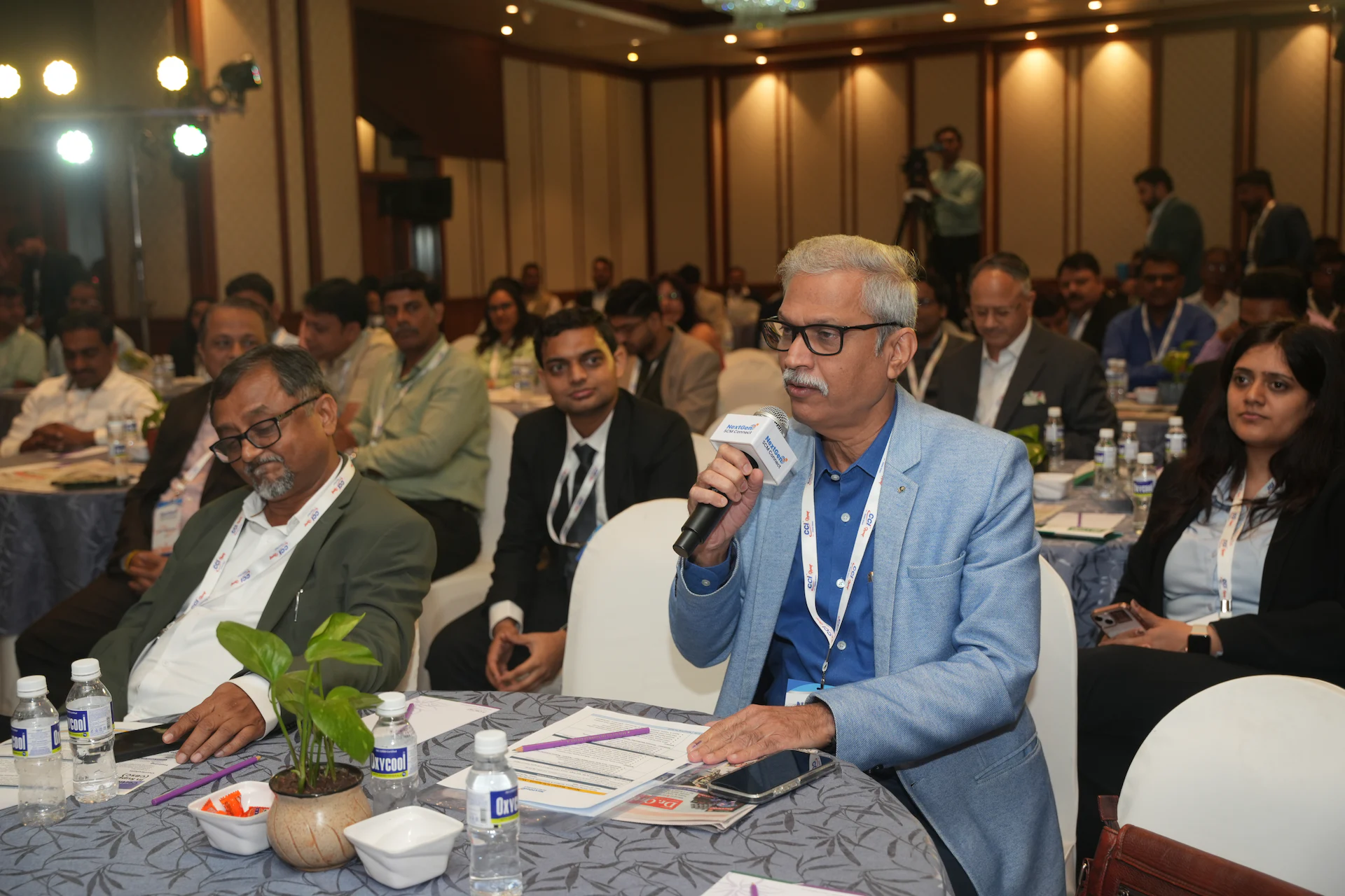 Attendees engaging during sustainability panel