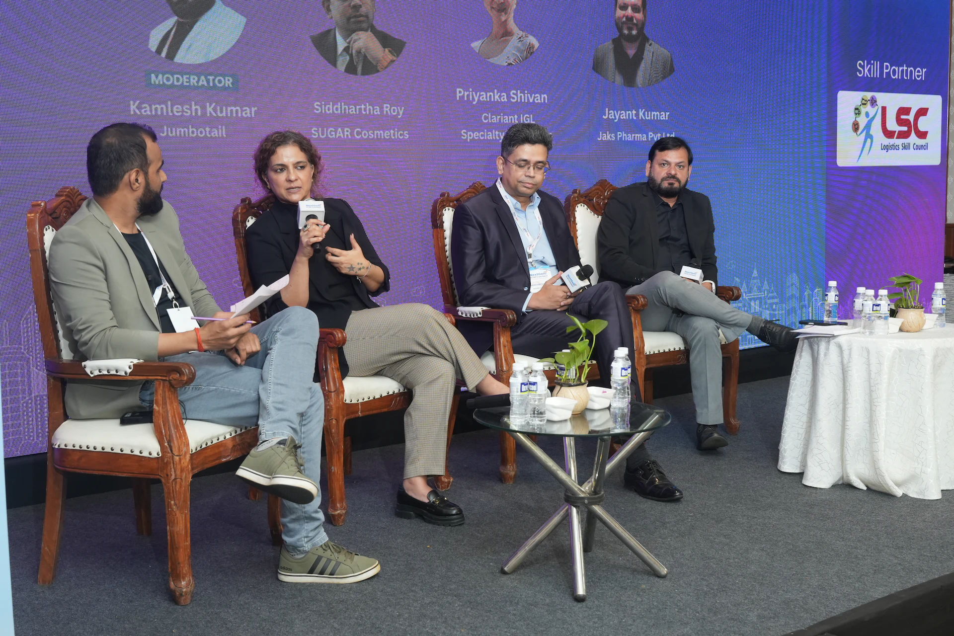 Panelists discussing last-mile delivery innovations