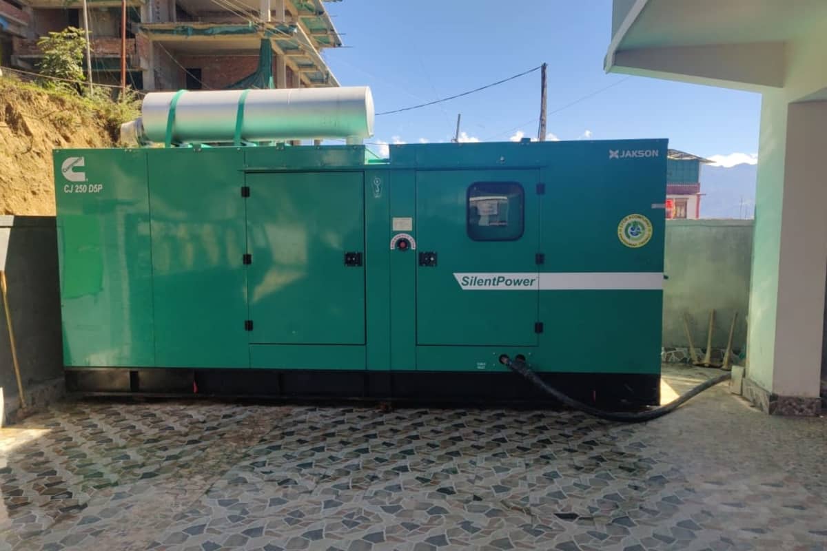 Outdoor SilentPower green diesel generator providing uninterrupted power backup.