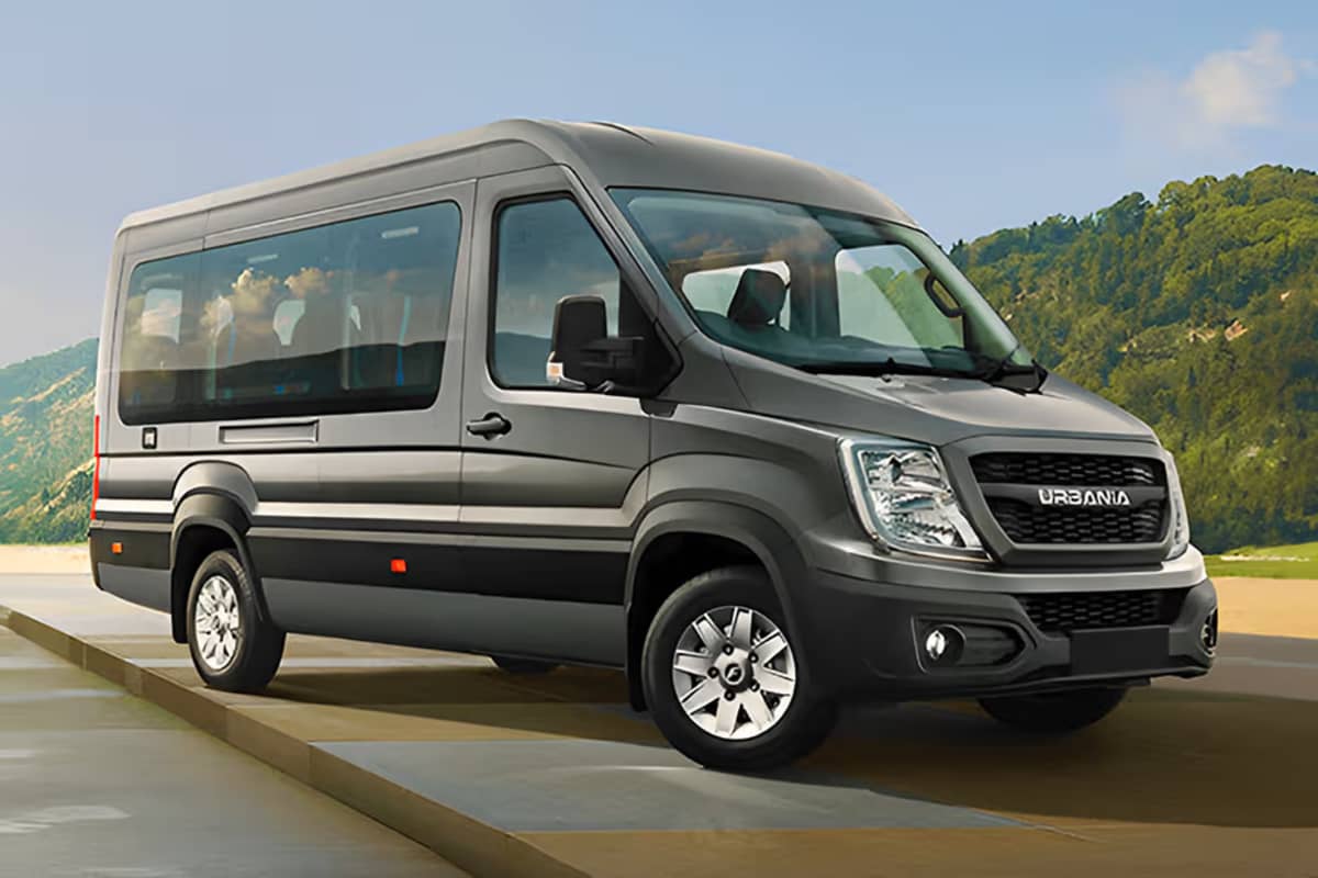 Force Urbania 17-seater luxury tourist coach featuring panoramic passenger windows, high roofline, and sculpted metallic exterior.