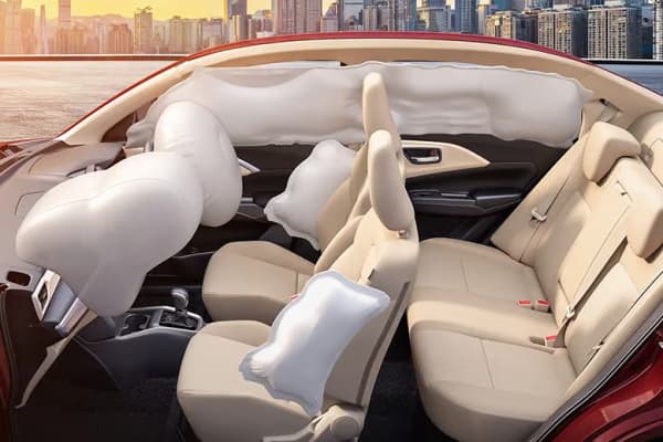 Maruti Suzuki Dzire interior safety configuration highlighting full 6-airbag protective shield and dual-tone passenger seating.