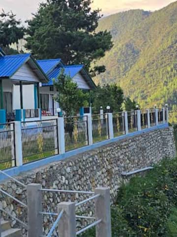 Executive Cottage bedroom at Wangdi's Resort Dirang.