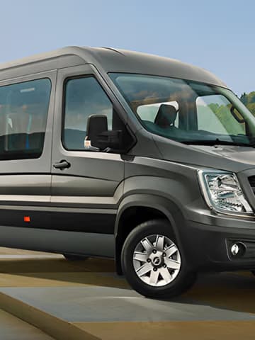 Force Urbania 17-seater luxury tourist coach featuring panoramic passenger windows, high roofline, and sculpted metallic exterior.