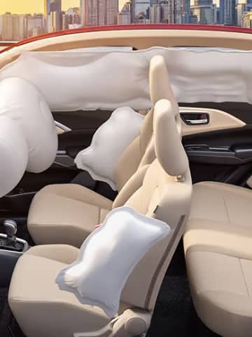 Maruti Suzuki Dzire interior safety configuration highlighting full 6-airbag protective shield and dual-tone passenger seating.