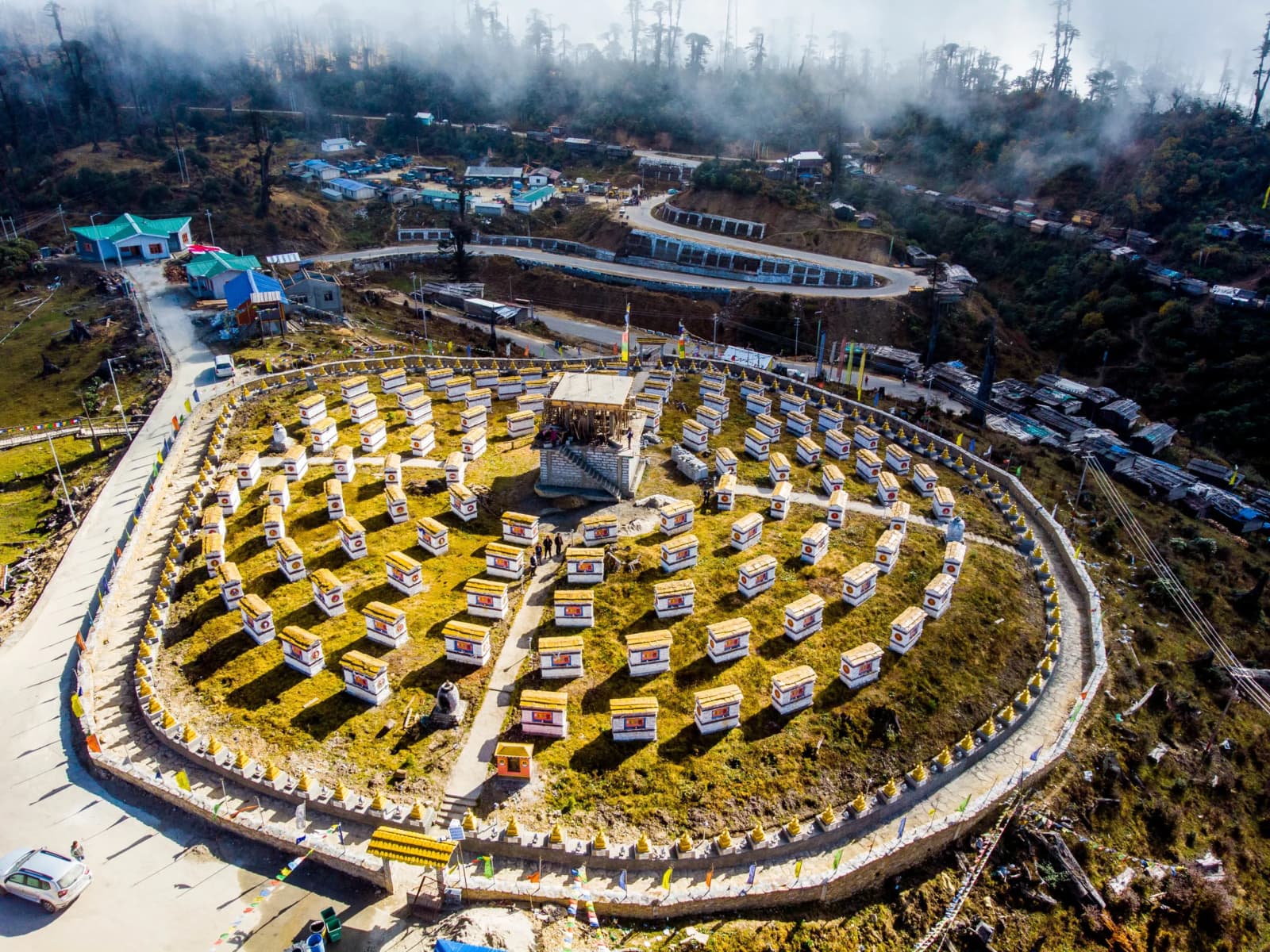 Agricultural terraces and pine-forested slopes overlooking Dirang Valley