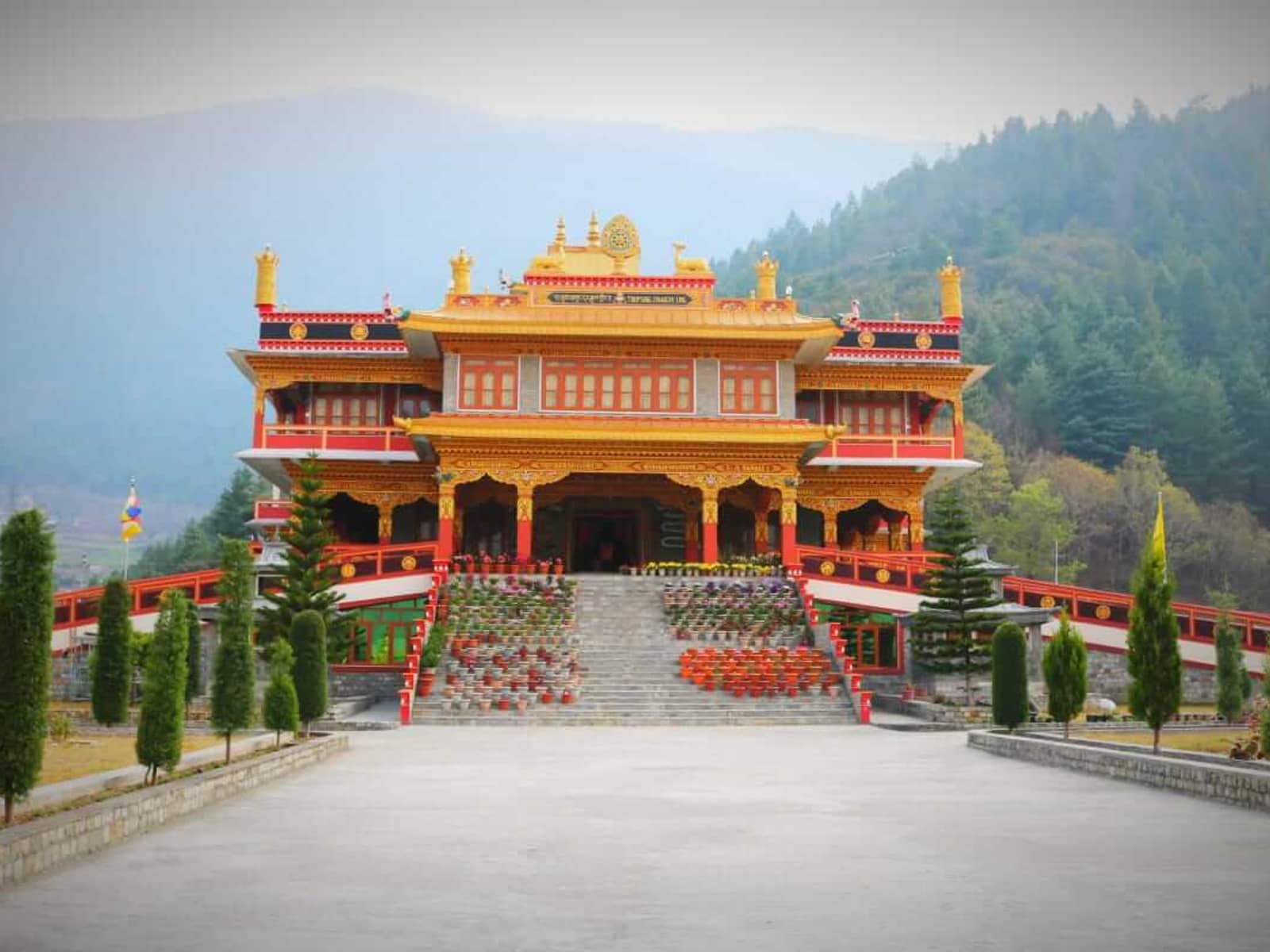 Grand golden spires and assembly hall of Thupsung Dhargye Ling Monastery in Dirang