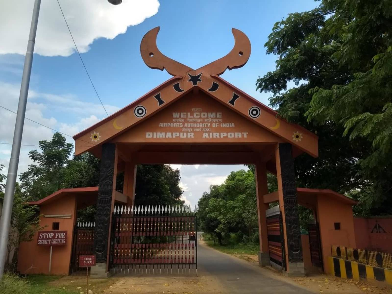 Dimapur Airport main entry gate facade with traditional Naga architectural motifs
