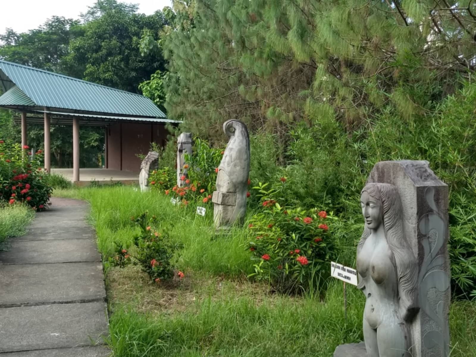 Collection of ancient sculptured stone monolith pillars preserved at Kachari Rajbari
