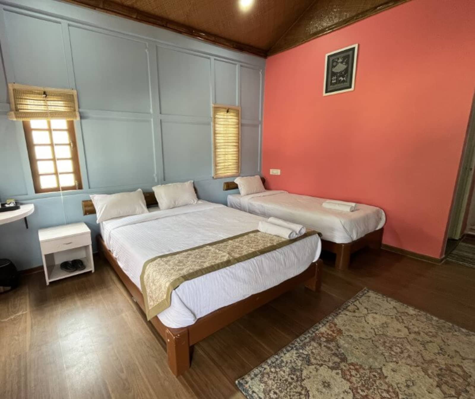 River View Executive AC Triple Room configured for families with 1 king and 1 single bed
