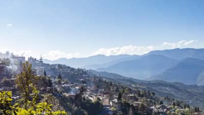 The mountain town of Bomdila nestled against the pine-forested slopes.