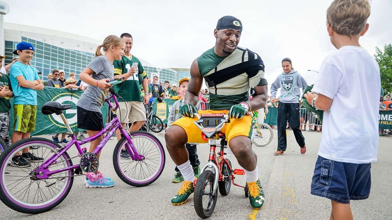 Packers bike to practice at Nitschke Field