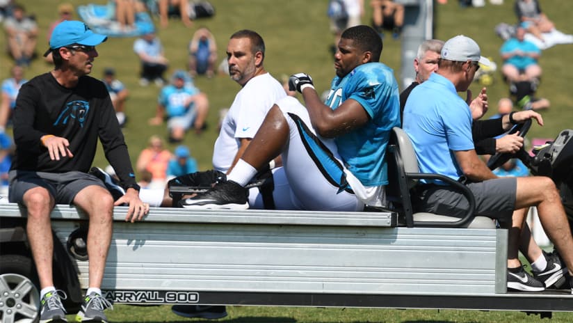 All-Pro right tackle went down setting himself to pass block.