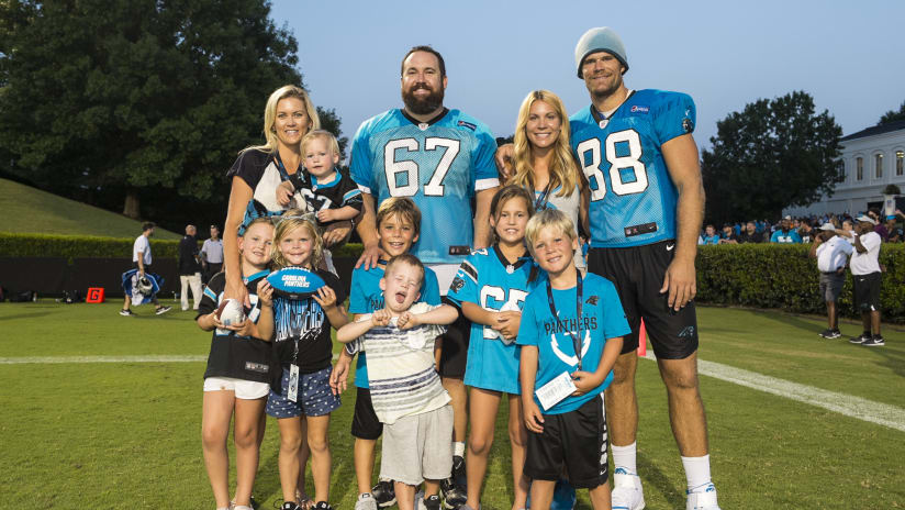 View photos of Panthers players and their families after practice.